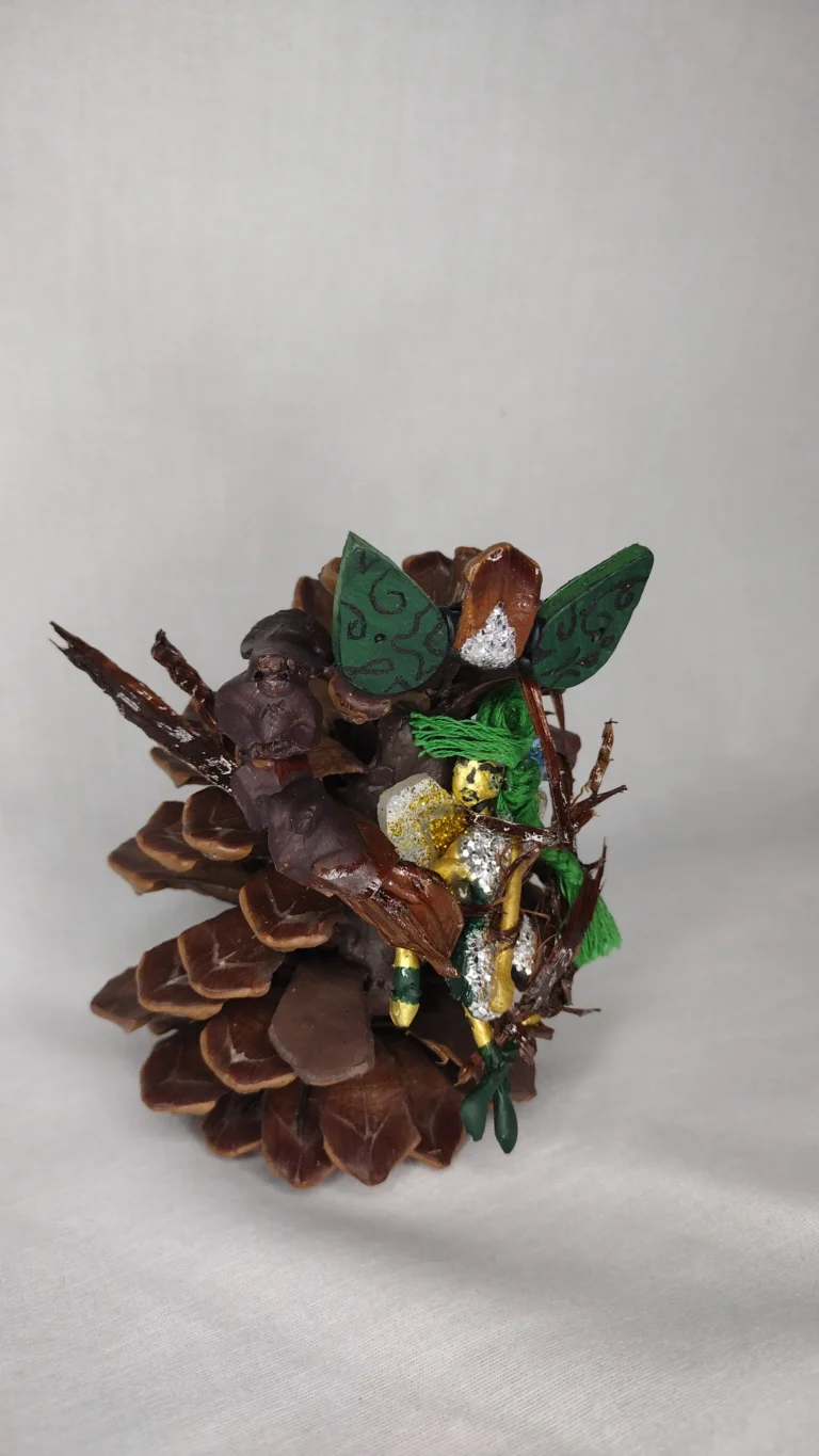 Tragic Irony painted and decorated pinecone