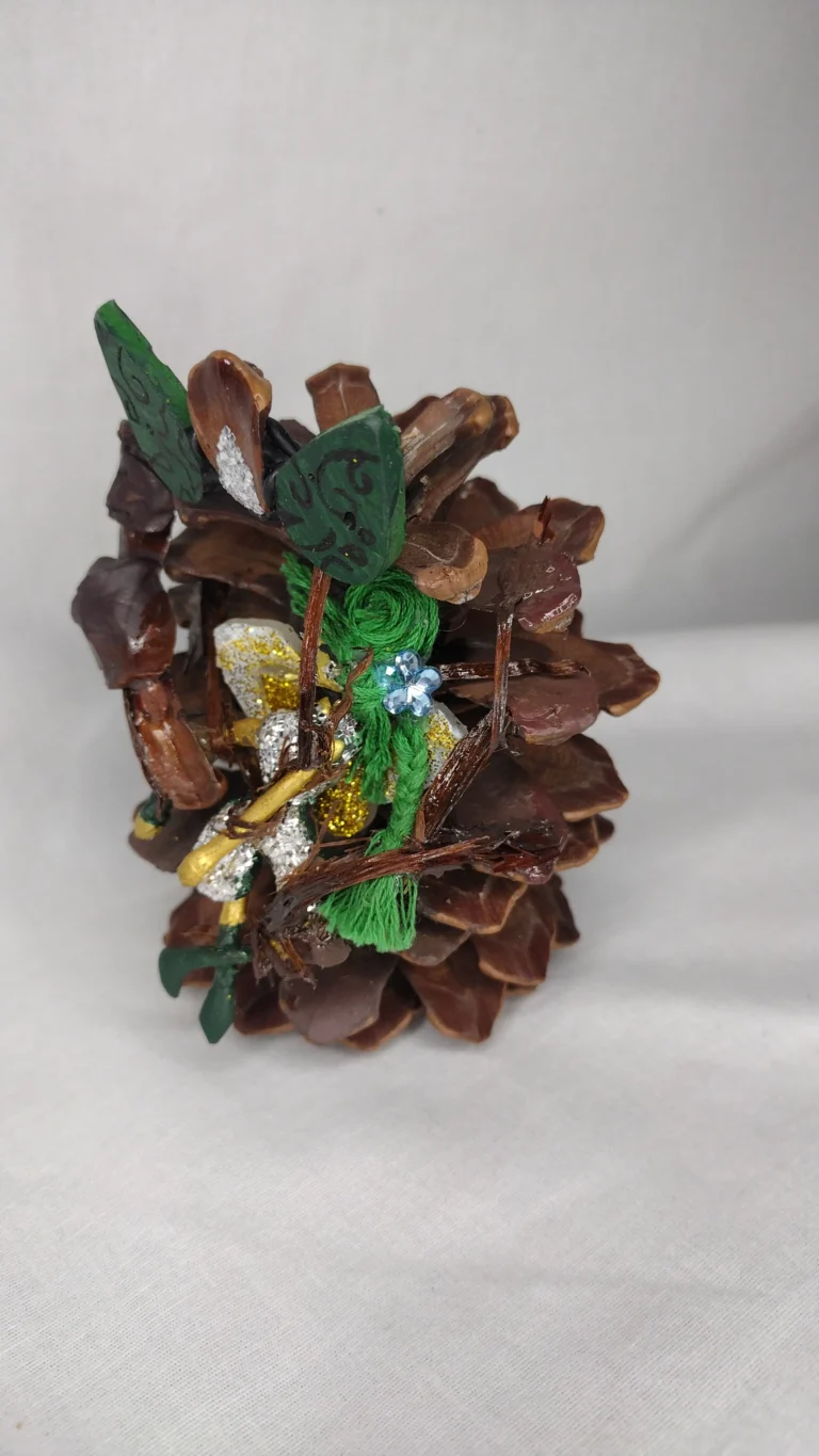 Tragic Irony painted and decorated pinecone